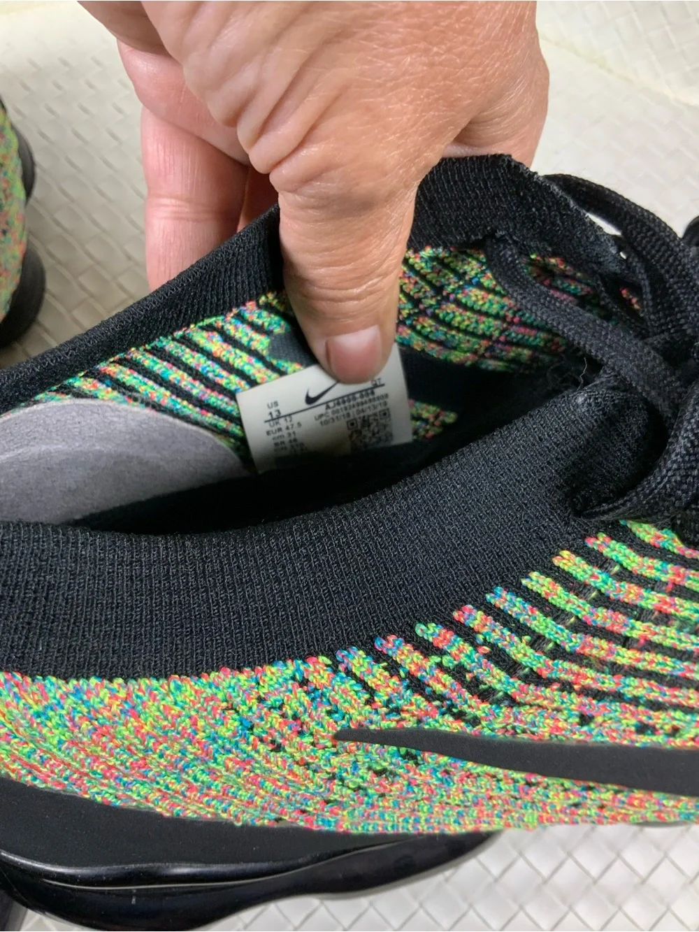 Nike Men’s Multicolor Flyknit Athletic Shoes with Black Accents
